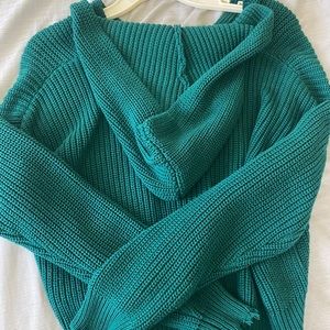 Green hooded sweater